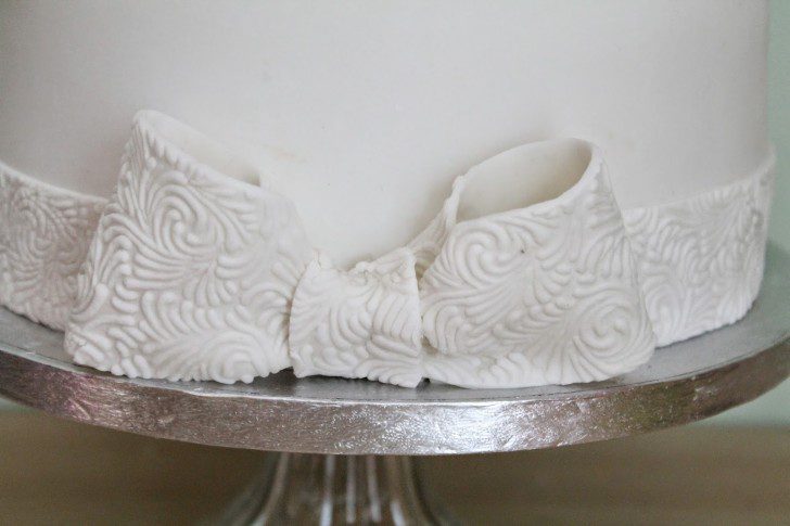 tarta de primera comunión detalle textura lazo